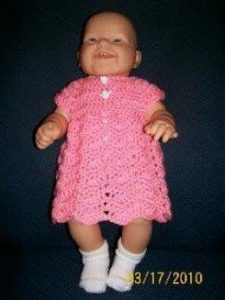 Pink baby dress with ripple pattern