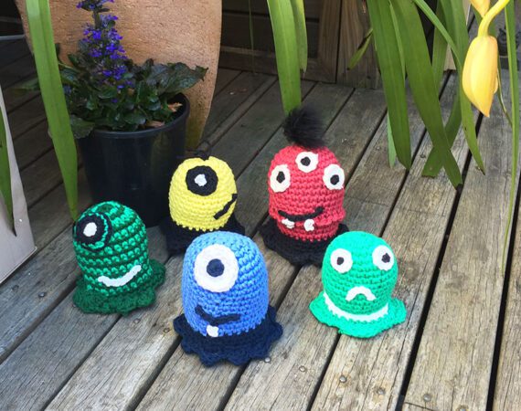 family of crochet monster toys